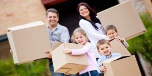 family with moving boxes